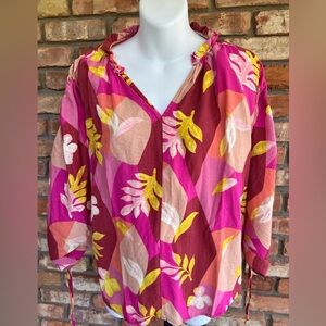Vibrant Floral Blouse with over sized drop shoulder and tie strings.